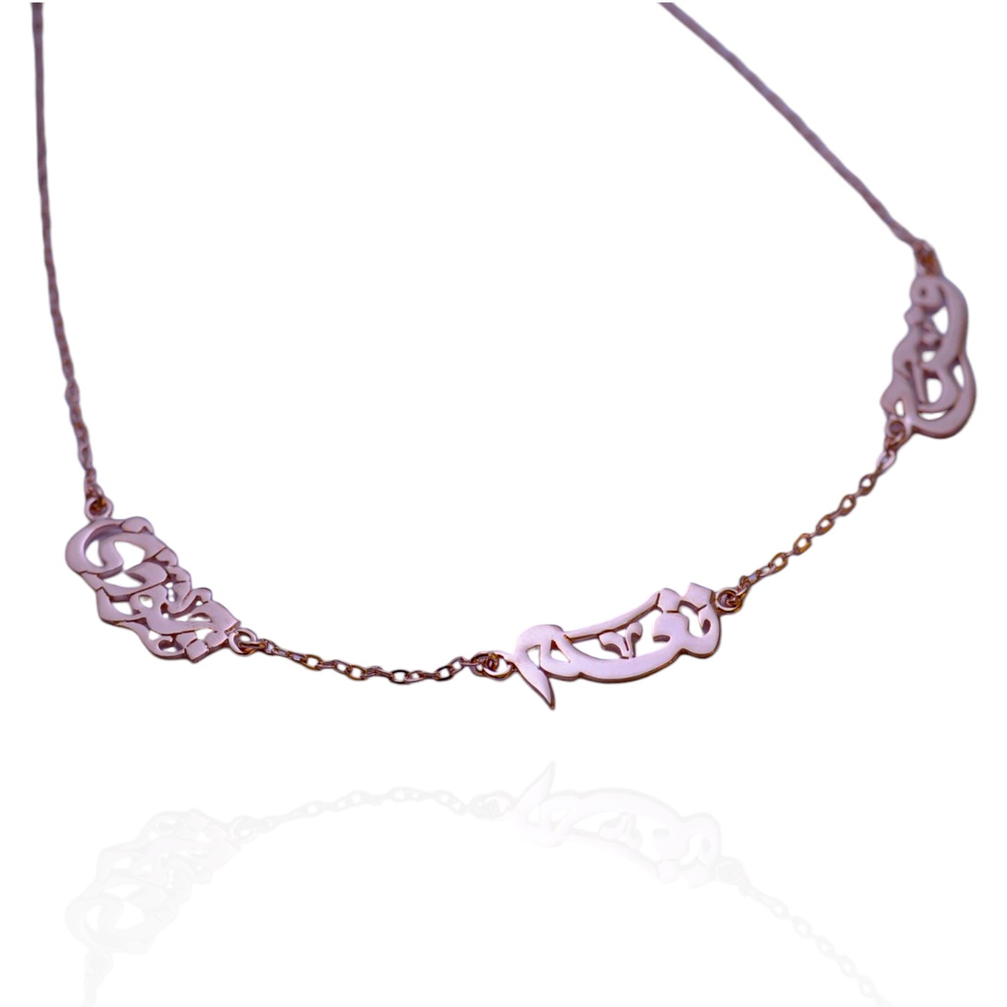Necklace in rose gold with names pendants on a white background