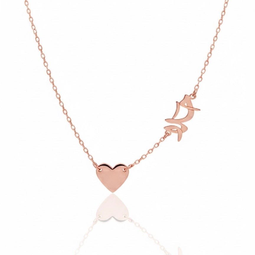 Rose gold necklace with heart and butterfly pendant on a white background
